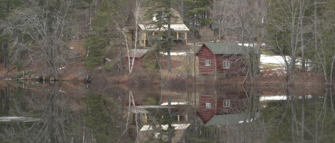 Cabin on a glassy lake