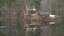 Cabin on a glassy lake