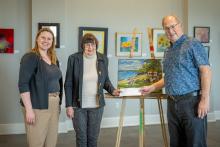 Painting of iconic Queen's Royal Park Gazebo is the cover for the 2024-2025 Stay Niagara-on-the-Lake Tourism Map